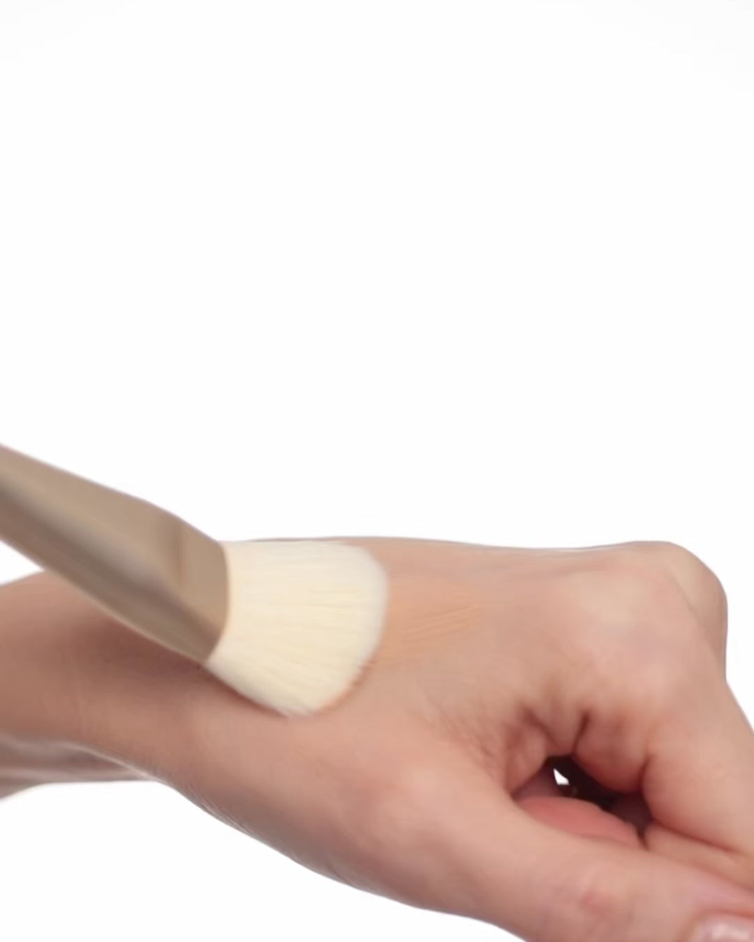 Foundation makeup brush applying foundation