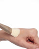 Foundation makeup brush applying foundation